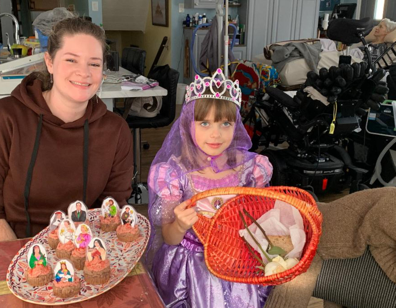 Rosie and St Elizabeth of Hungary with All Saints Day cupcakes.